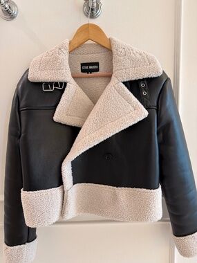Faux leather with fleece lined interior